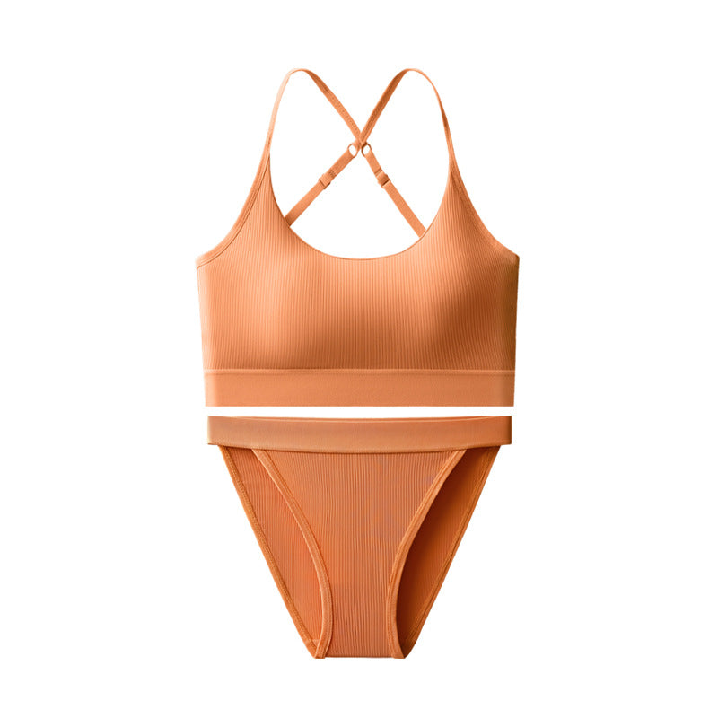 Orange bikini set on a white background