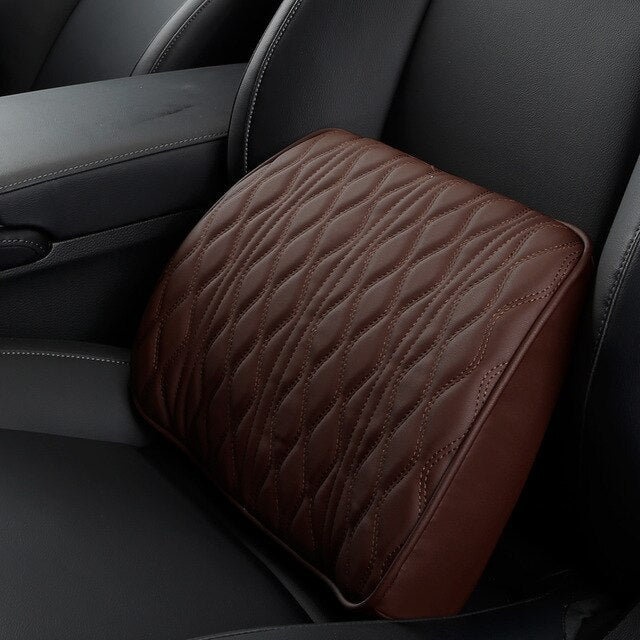 Brown leather headrest cover in a car interior