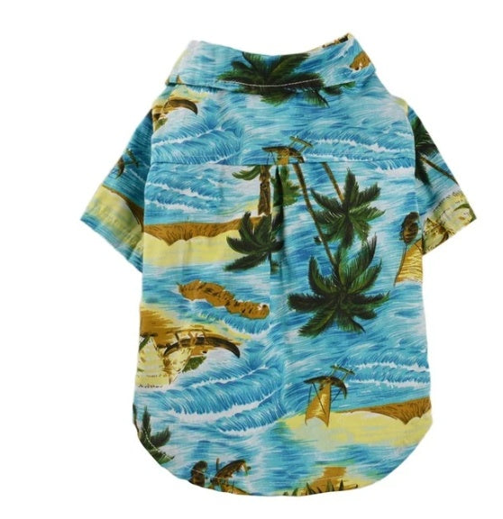 Dog shirt with tropical beach design featuring palm trees and blue ocean.