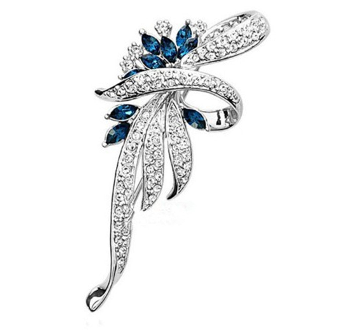 Silver brooch with blue gemstones on a white background