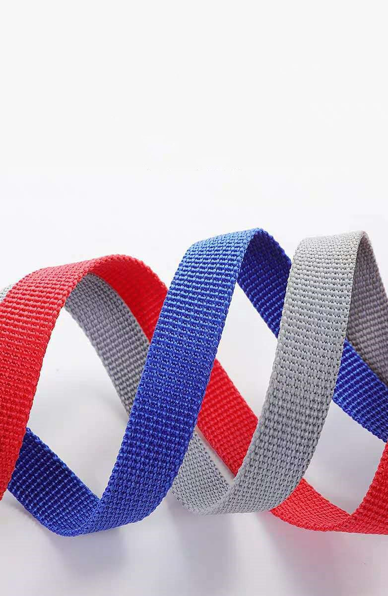 Three woven belts in red, blue, and gray on a white background