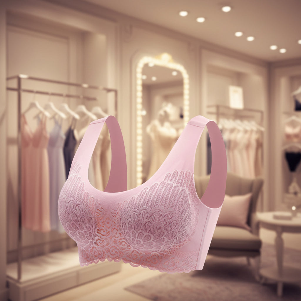 Pink lace bra on a white background