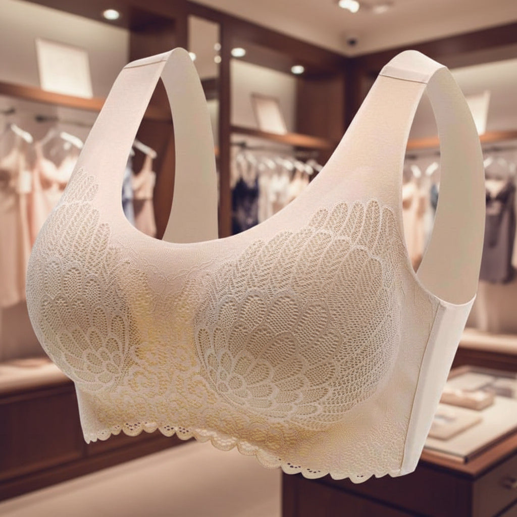 Beige lace bra on a white background