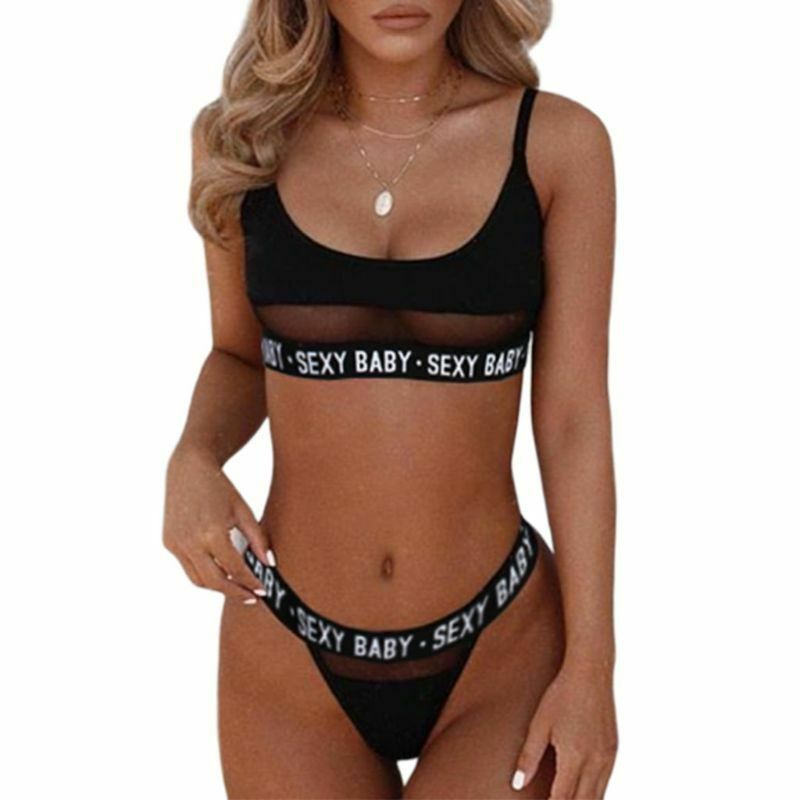 Black bikini set with 'SEXY BABY' text on a white background