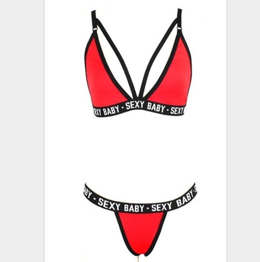 Red bikini with 'SEXY BABY' text on a white background