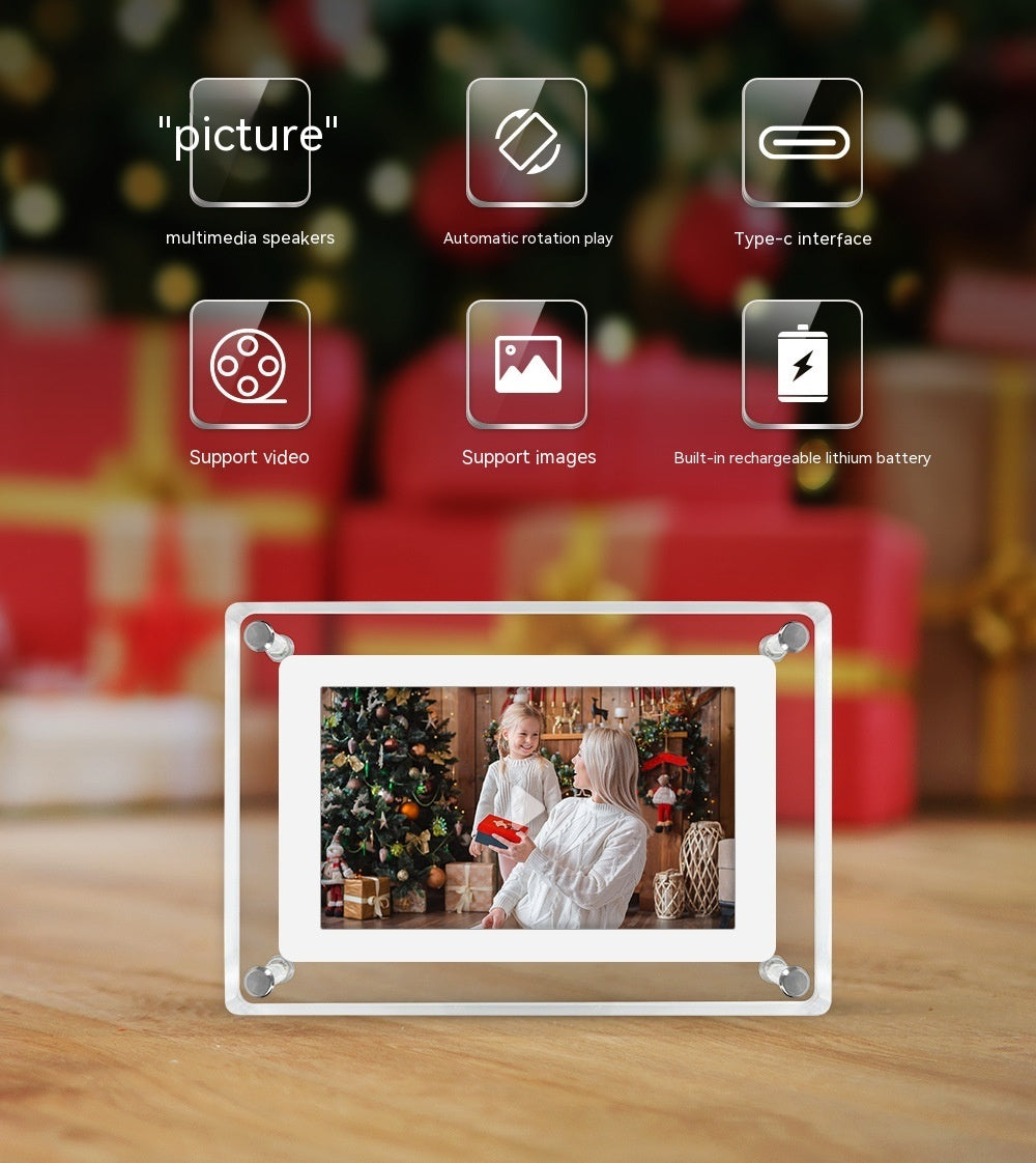 Digital photo frame displaying a family photo with Christmas decorations, on a wooden surface.