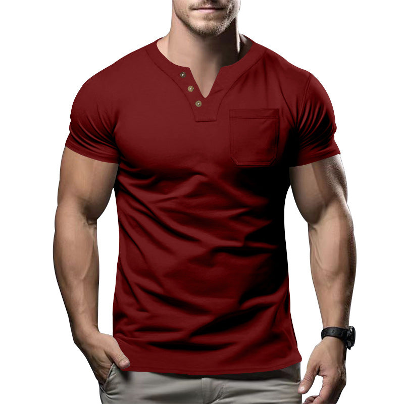 Man wearing a red henley shirt on a white background