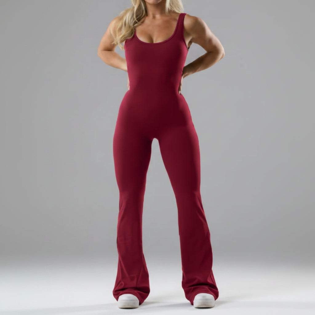 Person wearing a red jumpsuit on a plain background