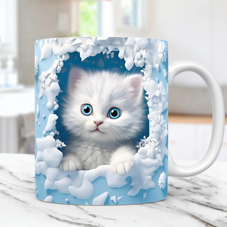 Mug with a design of a white kitten with blue eyes on a light blue background.