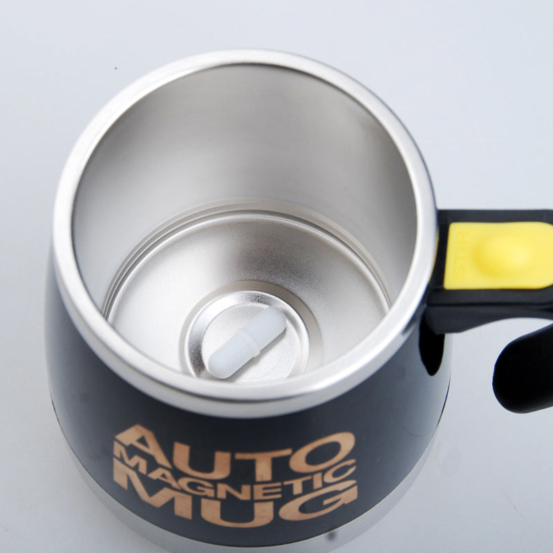 Auto Magnetic Mug with black body and yellow handle on a light gray background
