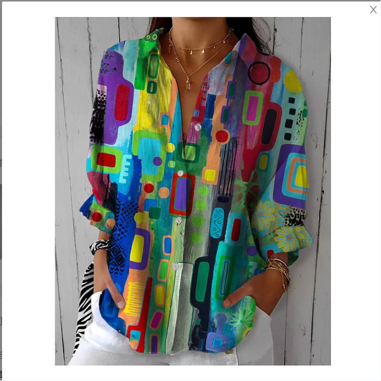 Person wearing a colorful abstract patterned shirt against a white background