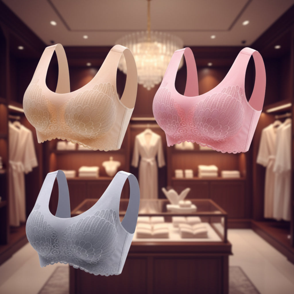 Three bras in beige, pink, and gray on a white background