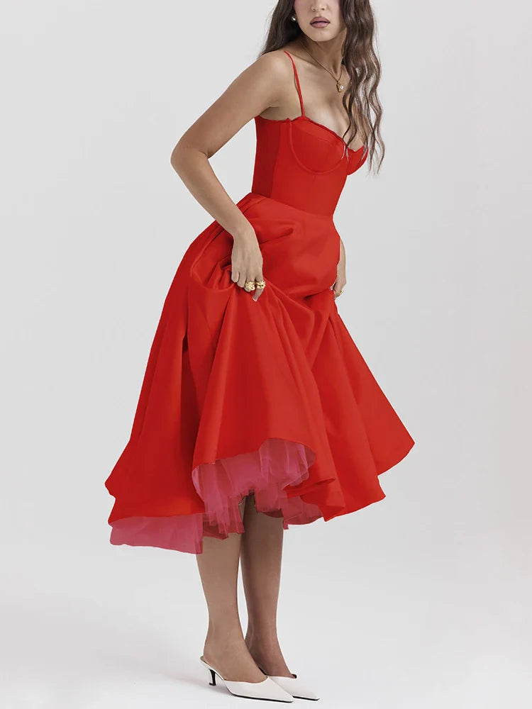 Red dress worn by a model on a white background