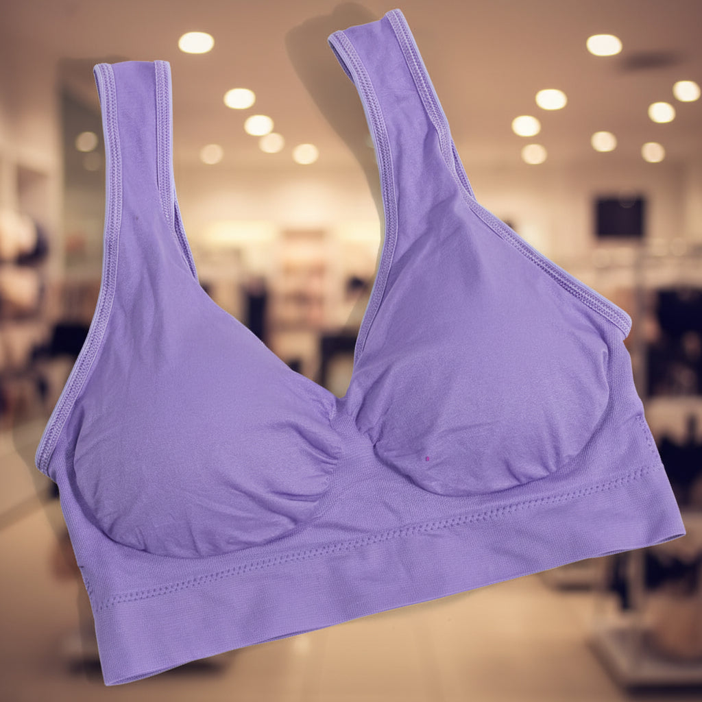 Purple sports bra on a white background