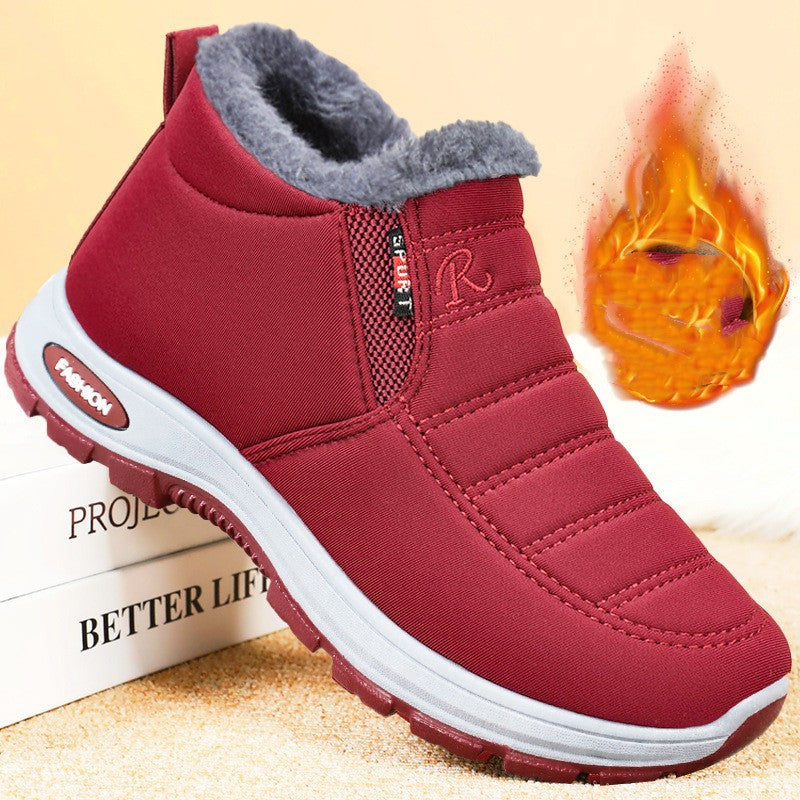 Red winter shoe with gray lining on a beige background