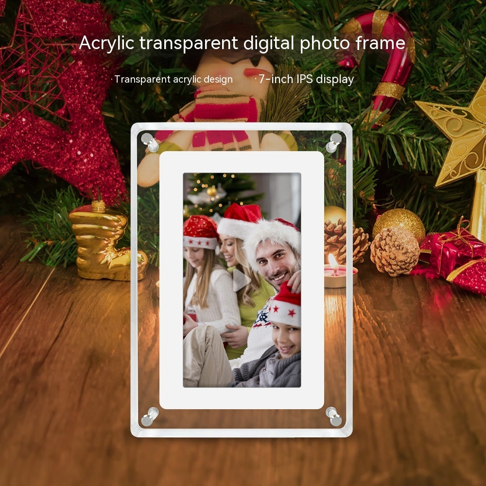 Acrylic transparent digital photo frame displaying a family photo in front of a Christmas tree.