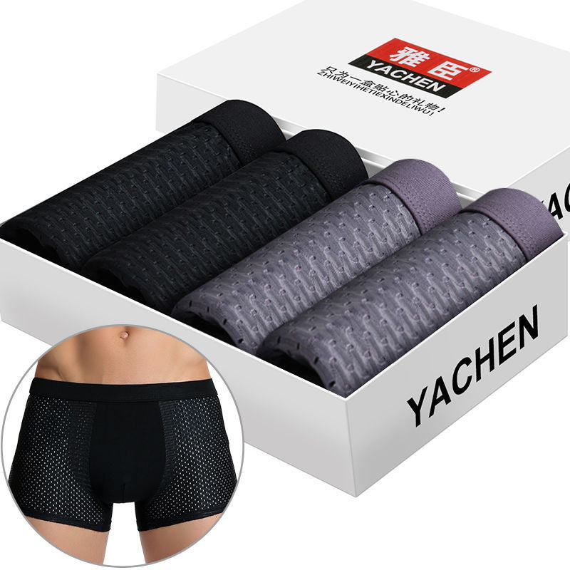 Box of Yachen men's underwear with close-up of product on a white background