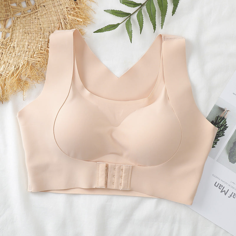 Beige bra on a light background with decorative elements