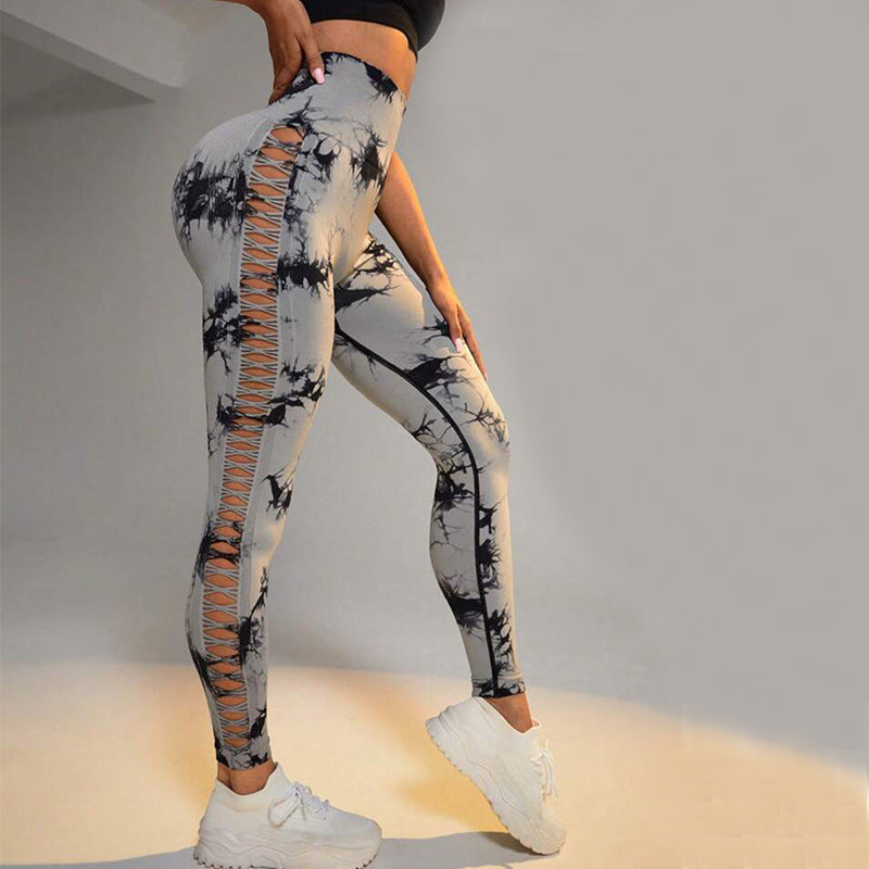 Tie-dye leggings with a unique design on a plain background