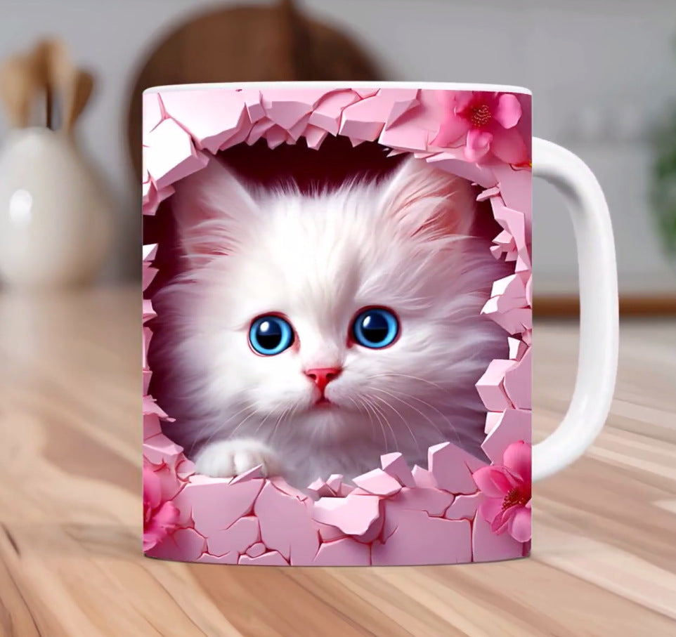 Mug with a design of a white kitten with blue eyes on a pink floral background