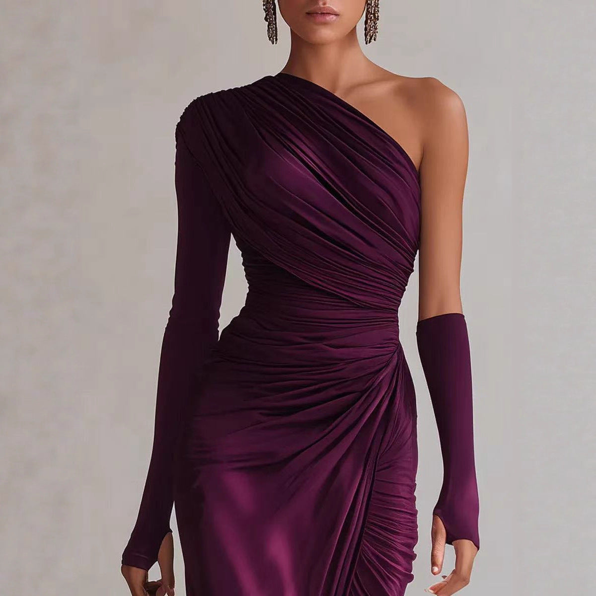 Purple one-shoulder dress with long sleeves on a plain background