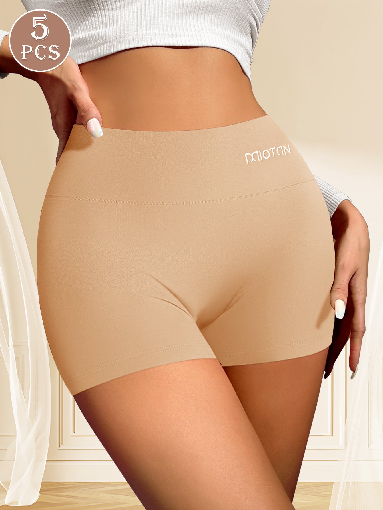 Beige shapewear shorts with 'Miotan' branding on a neutral background