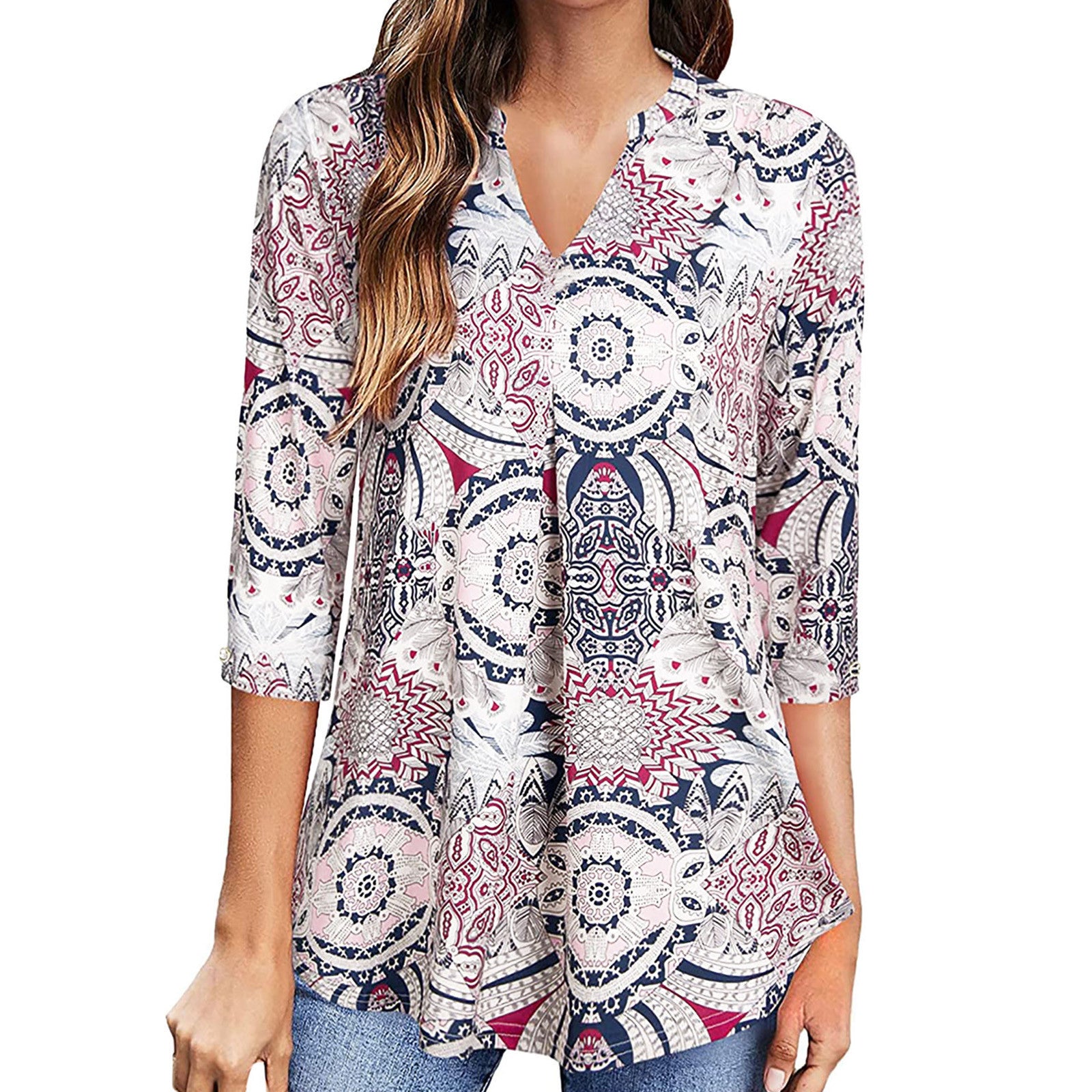 Woman wearing a patterned blouse with a white background