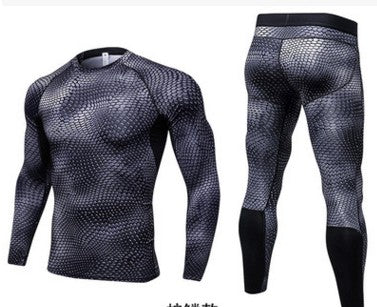 Black and gray compression shirt and pants set on a white background