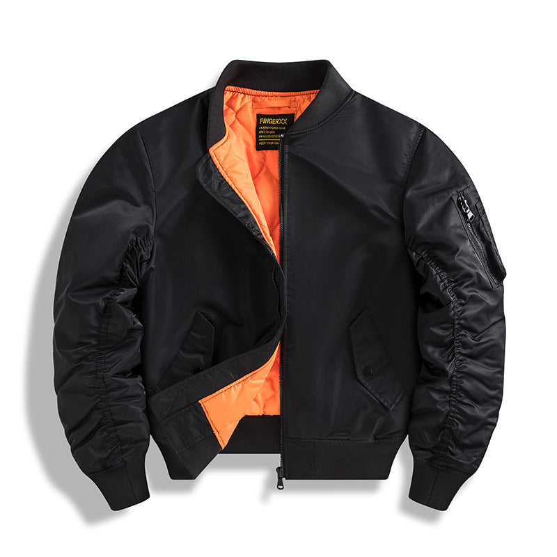 Black bomber jacket with orange lining on a white background