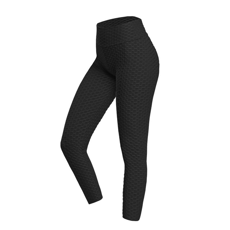 Black textured leggings on a white background
