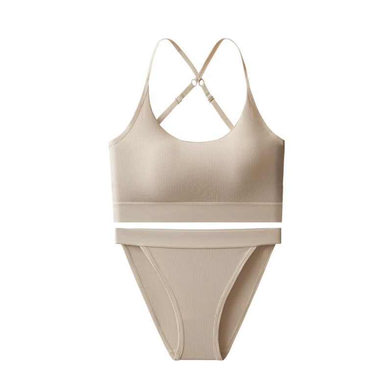 Beige bikini set on a white background