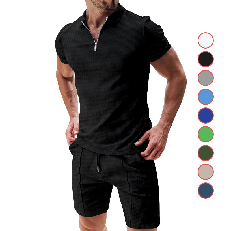 Man wearing a black athletic outfit with color swatches on a white background