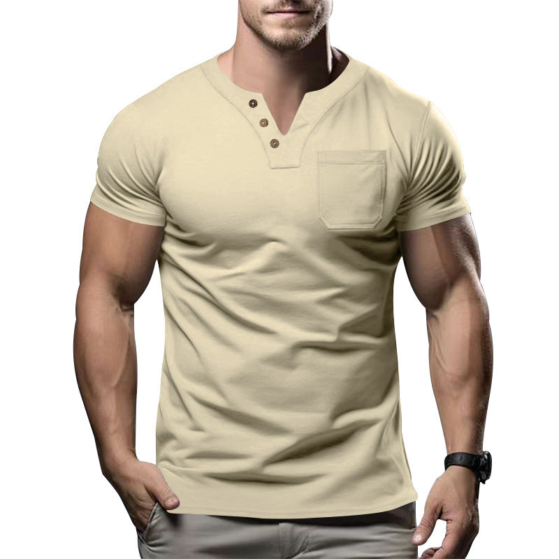 Man wearing a beige short-sleeve henley shirt on a white background