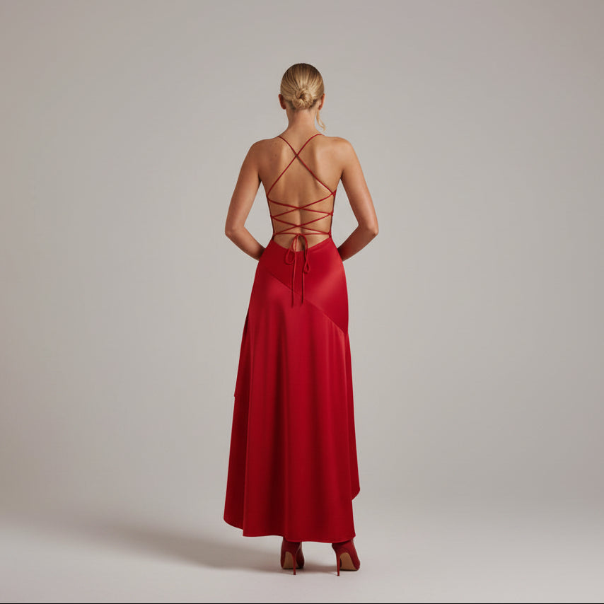 Red evening gown with open back on a white background