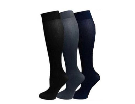 Three pairs of knee-high socks in black, gray, and navy on a white background