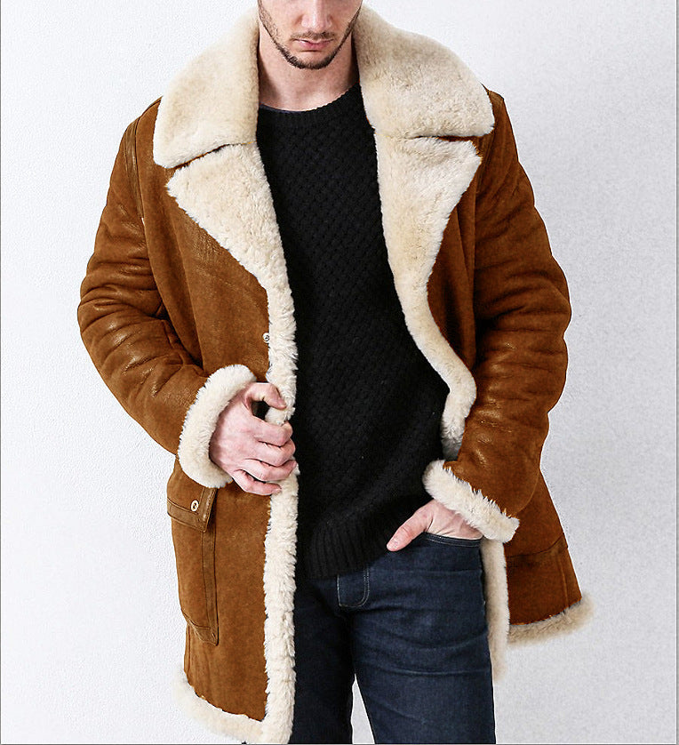 Man wearing a brown shearling coat with white fur lining on a white background