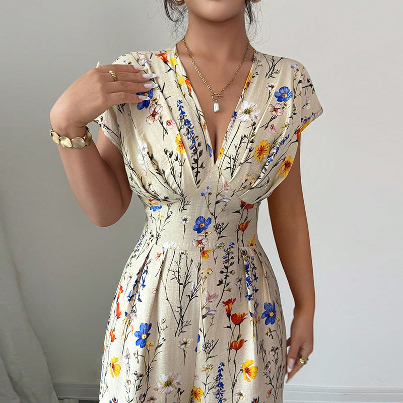 Woman wearing a floral dress with a neutral background