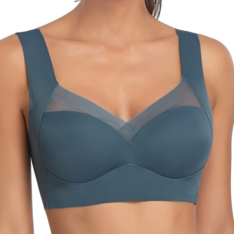 Teal bra on a model against a white background