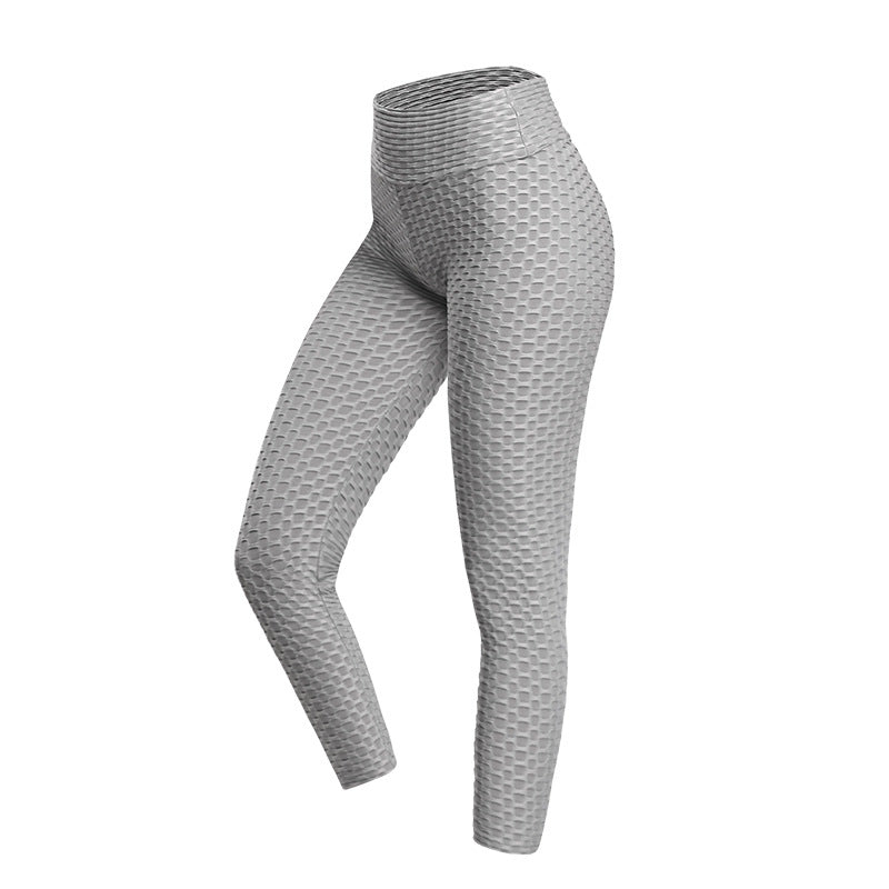 Gray leggings with a textured pattern on a white background
