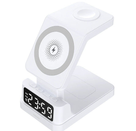 White digital clock with wireless charging pad on a white background