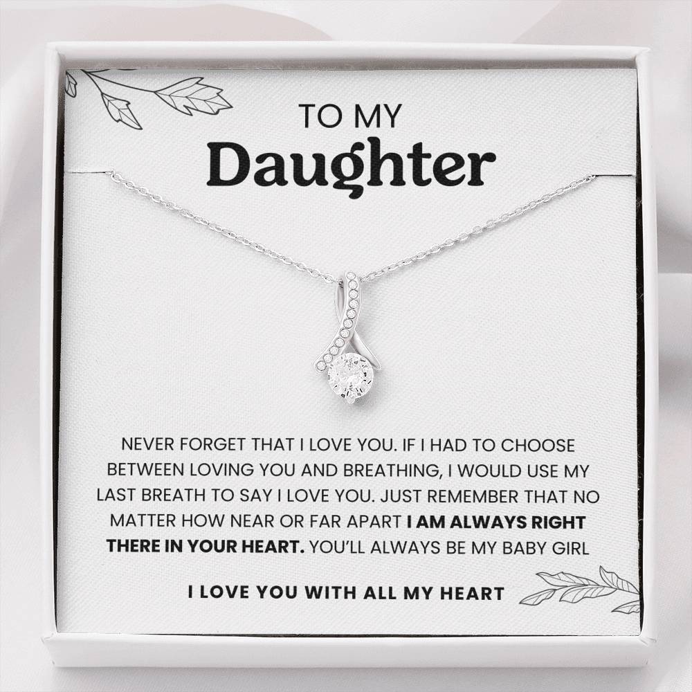 Necklace with a sentimental message card for a daughter on a white background
