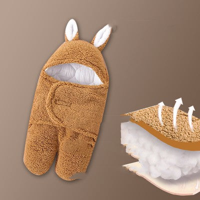 Brown plush baby wrap with bunny ears on a brown background