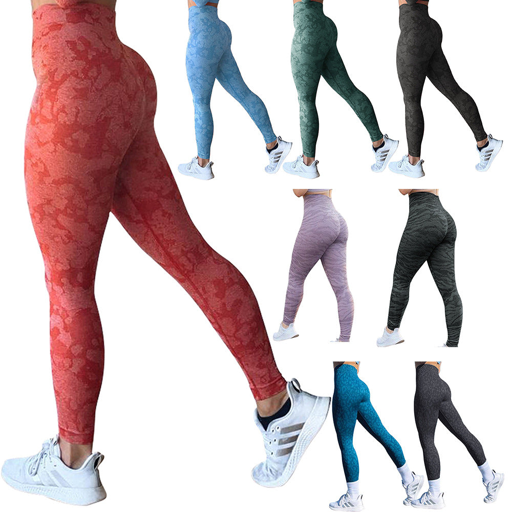 Leggings in various colors with a person wearing red leggings and white sneakers.