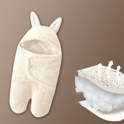 Baby wrap with rabbit ears on a brown background