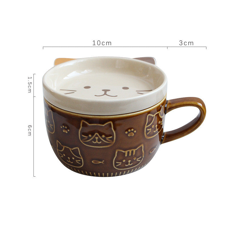 Cat-themed ceramic mug with measurements on a white background
