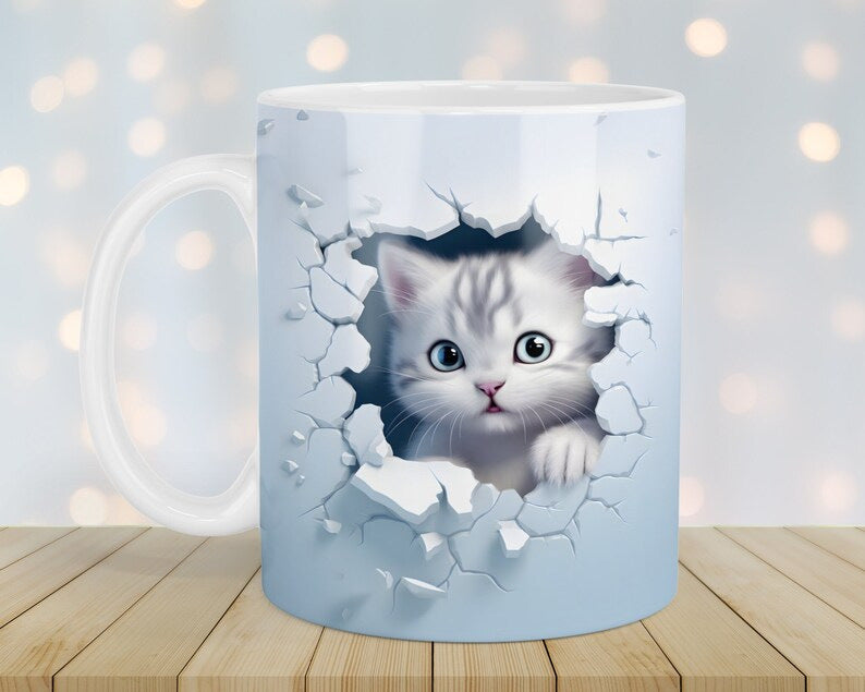 Mug with a design of a cat peeking through a broken wall on a wooden surface with a soft, blurred background.