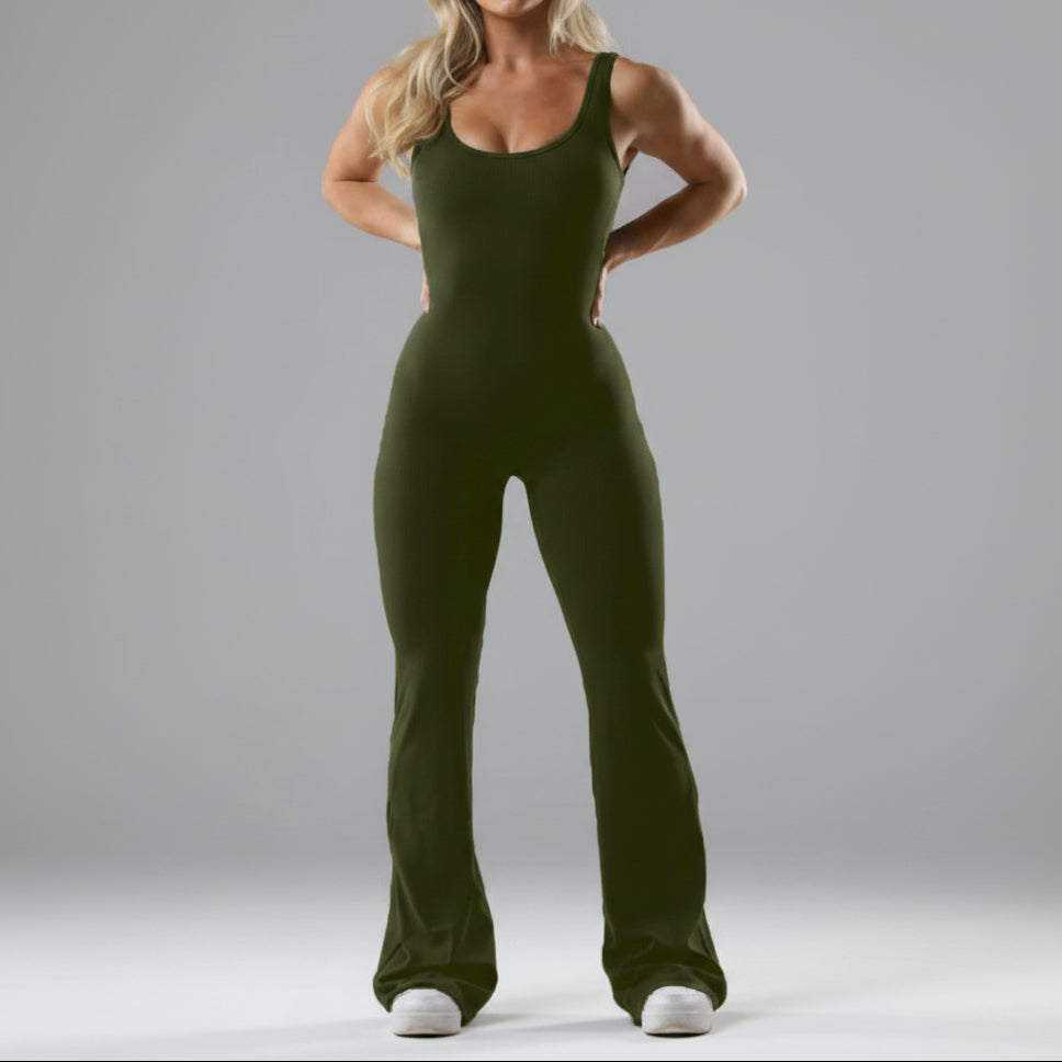 Person wearing a green jumpsuit on a plain background