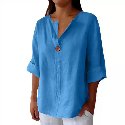 Blue shirt worn by a person on a white background