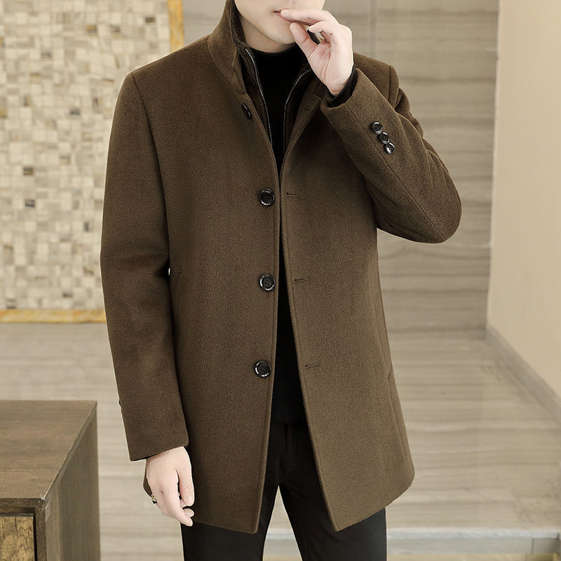 Brown coat worn by a person in an indoor setting