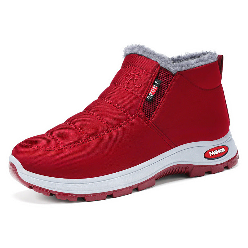 Red winter boot with gray lining on a white background